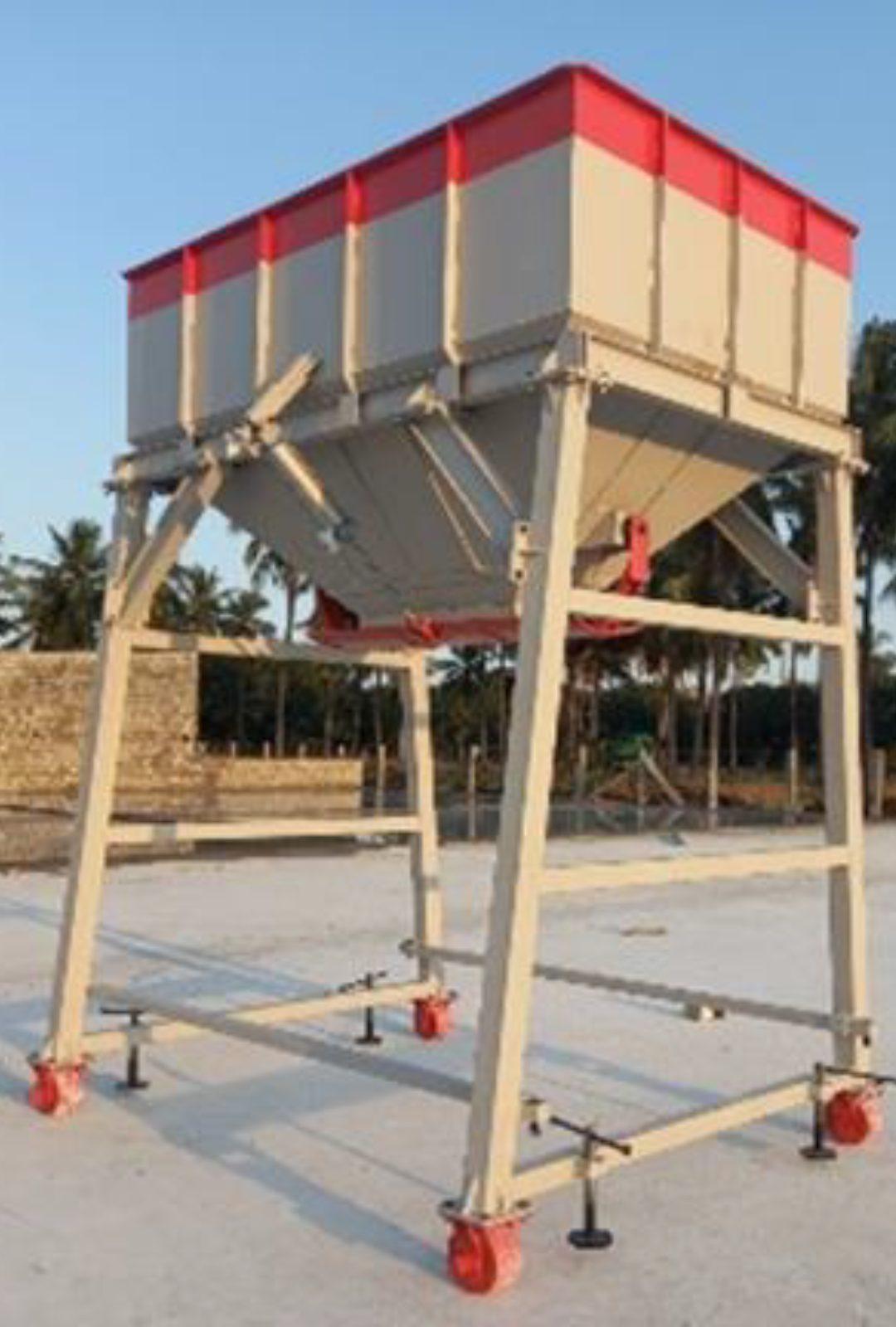 Four-compartment stationary hopper unit on a wheeled steel frame